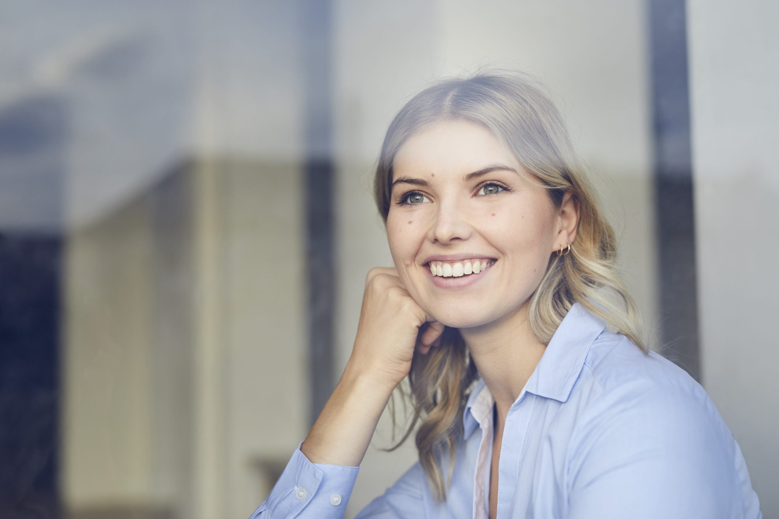Portrait of a smiling woman, illustrating Lightbody Women's Mental Health blog.